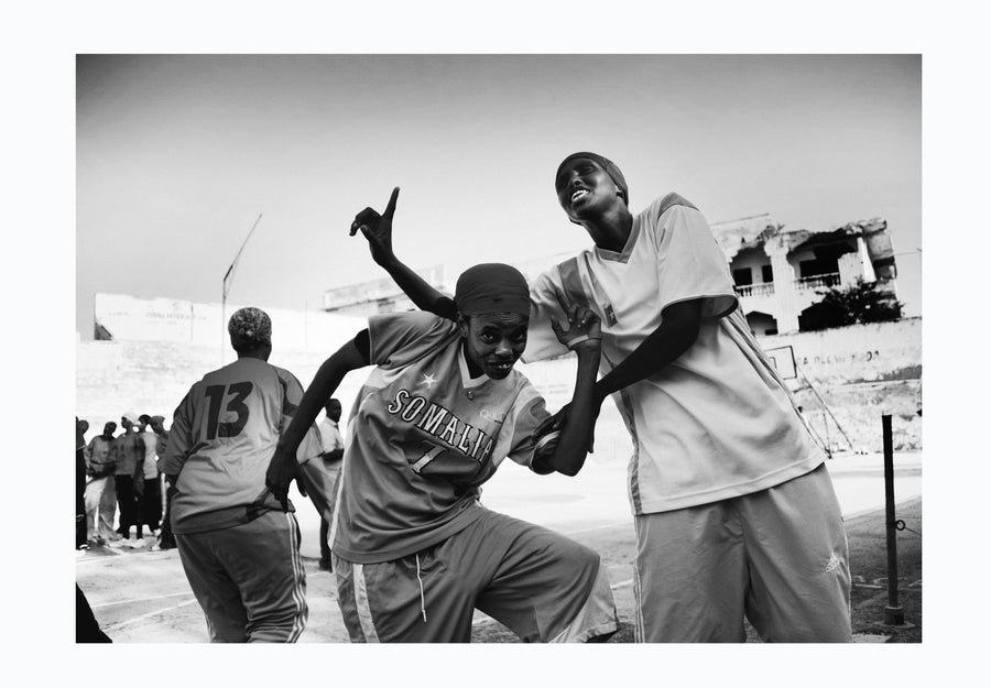 Women playing basketball in Mogadishu, Somalia 2012 - Photographic print, stamped and signed by Jan Grarup. Printet on Baryta Fine Art 325 gram paper in A2 (59,4 x 42cm)